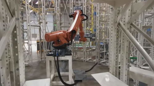 用机器人生产机器人 嘉定这座2万平方米的工厂里只需5名工人